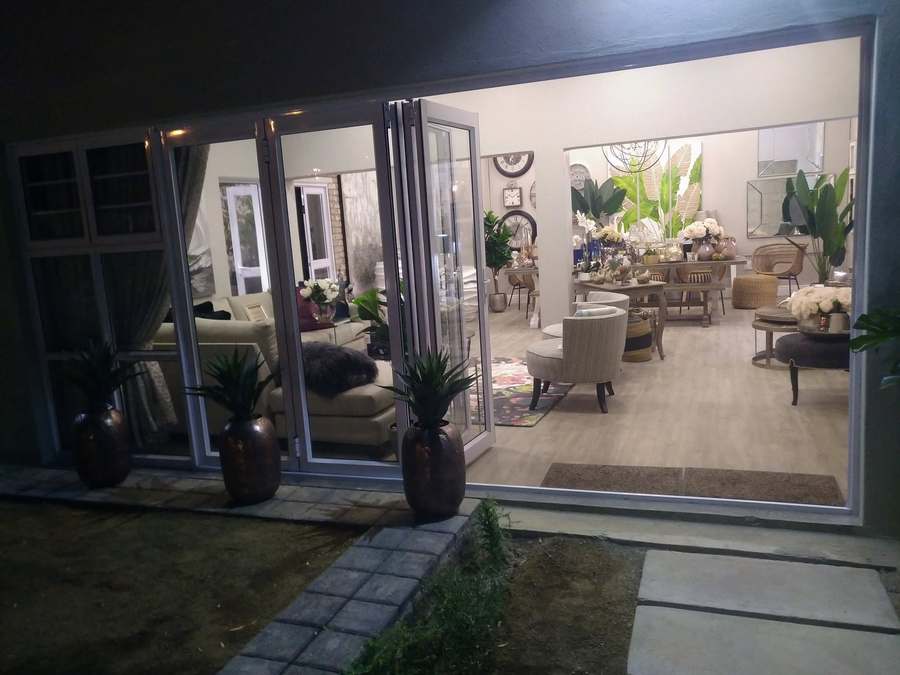 Stacking glass patio doors opening onto garden